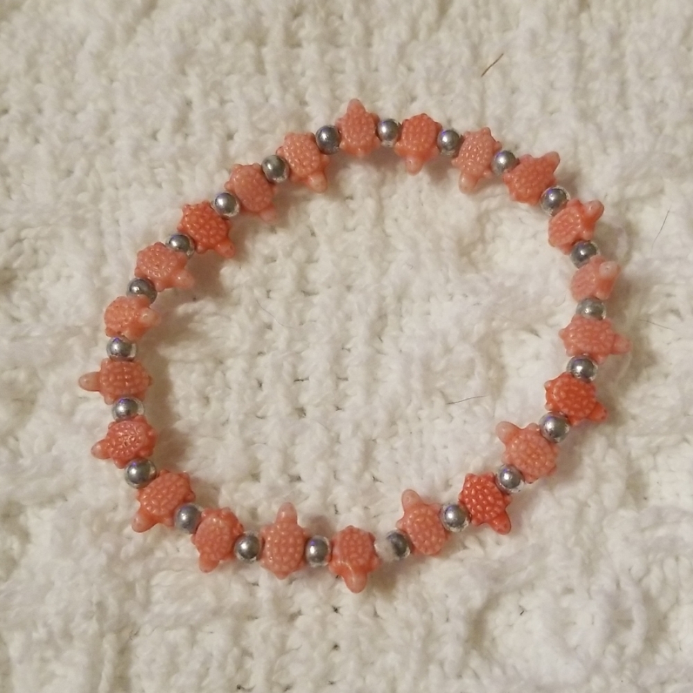 Stretch pink turtle bracelet